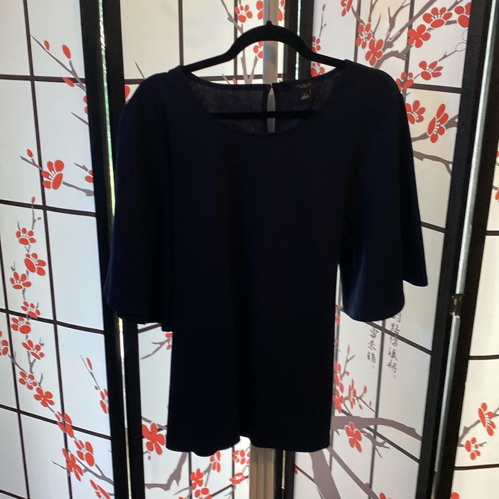 Gently used navy bluer Ann Taylor dress shirt.